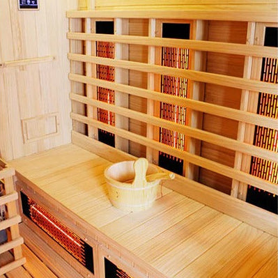 Infrared sauna with wooden interior and heating elements.